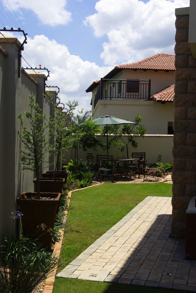 The place of a thousand smiles - Up-market, Balinese styled development ...